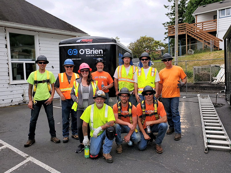 Group of construction workers posing for a photo